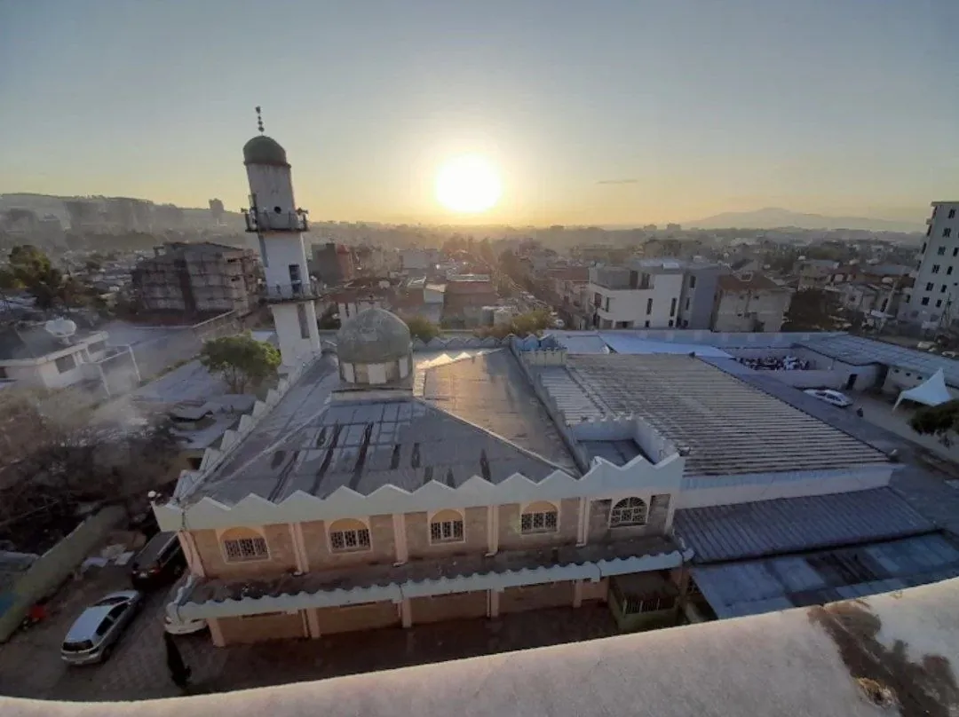 Elevated view of Al-Imran Mosque and its minaret at sunset