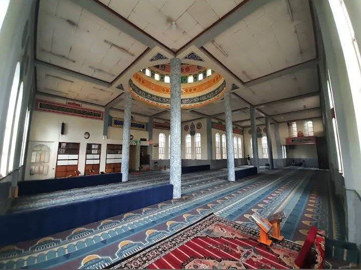 Prayer hall and central ceiling feature at Ferensay Mosque